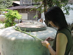 Nyan Bo Bo preparing a traditional Burmese weapon